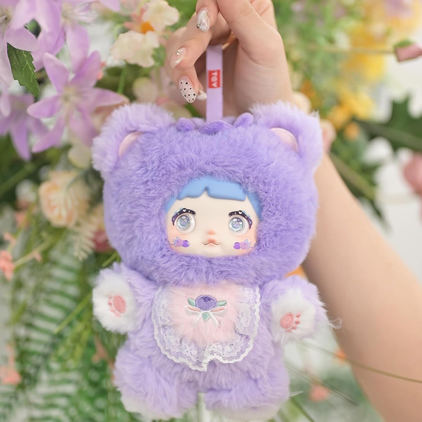 Nommi Plush Charm